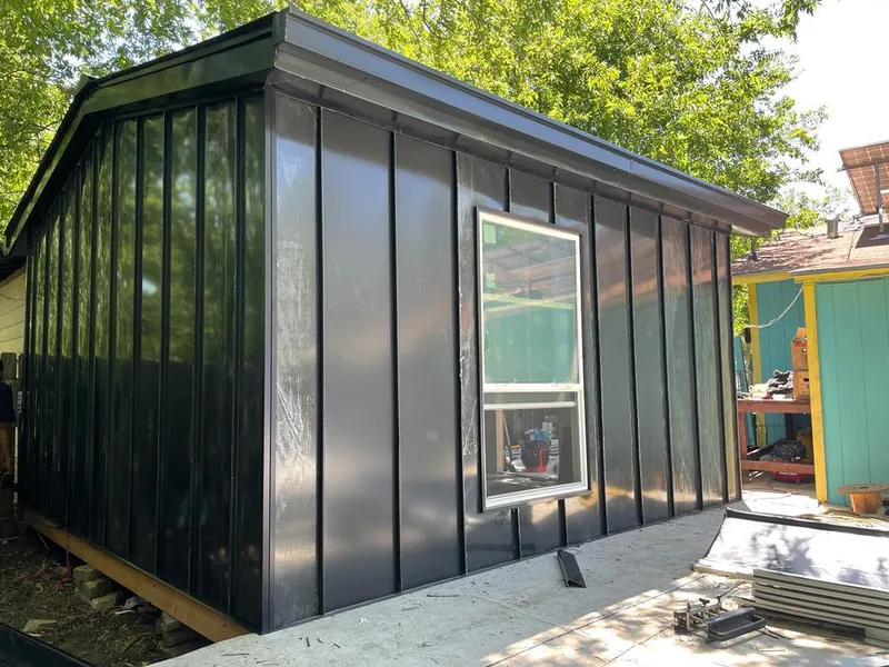 Black standing seam metal wall panels for Metal Roof Installation in Tysons