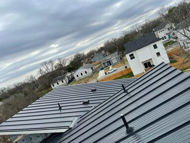 Standing seam metal roof panels with vents for Skylight Repair in Tysons